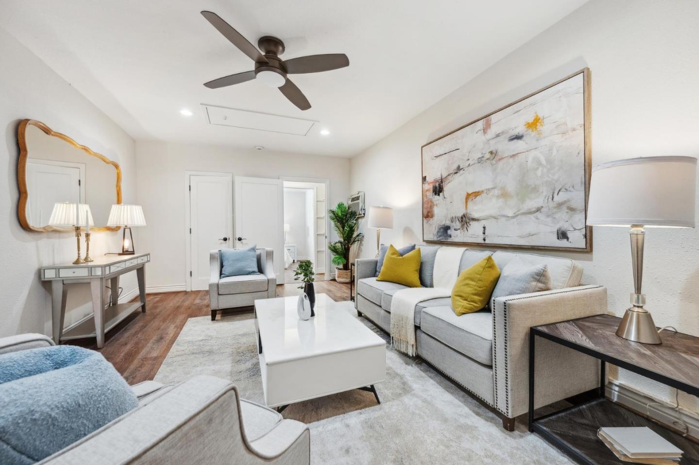 1035 Henderson Avenue Menlo Park, CA 94025 - Photo 6 of 38 a living room with furniture or couch and a painting on the wall