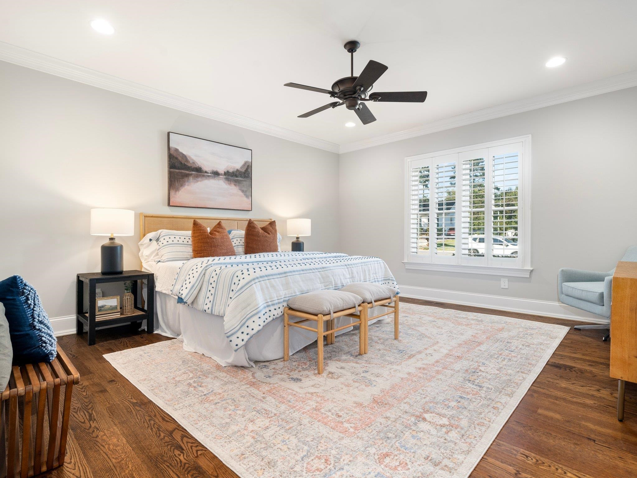 404 Ortega Road Raleigh, NC 27609 - Photo 25 of 43 a bedroom with a large bed a rug and a window
