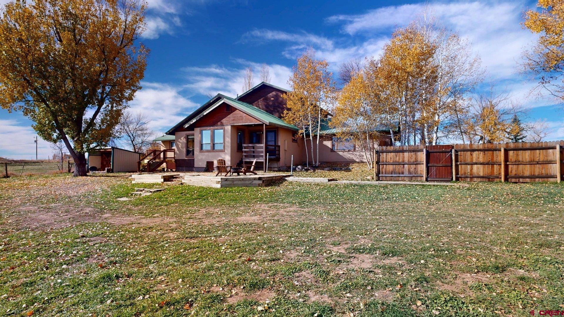 930 County Road 229 Durango, CO 81301 - Photo 30 of 32 a view of a yard with a house in the background