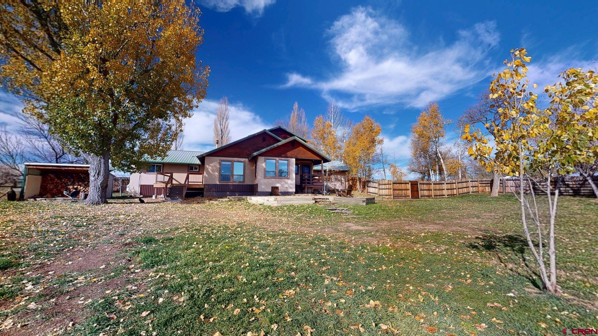 930 County Road 229 Durango, CO 81301 - Photo 31 of 32 a dirt road with trees in the background