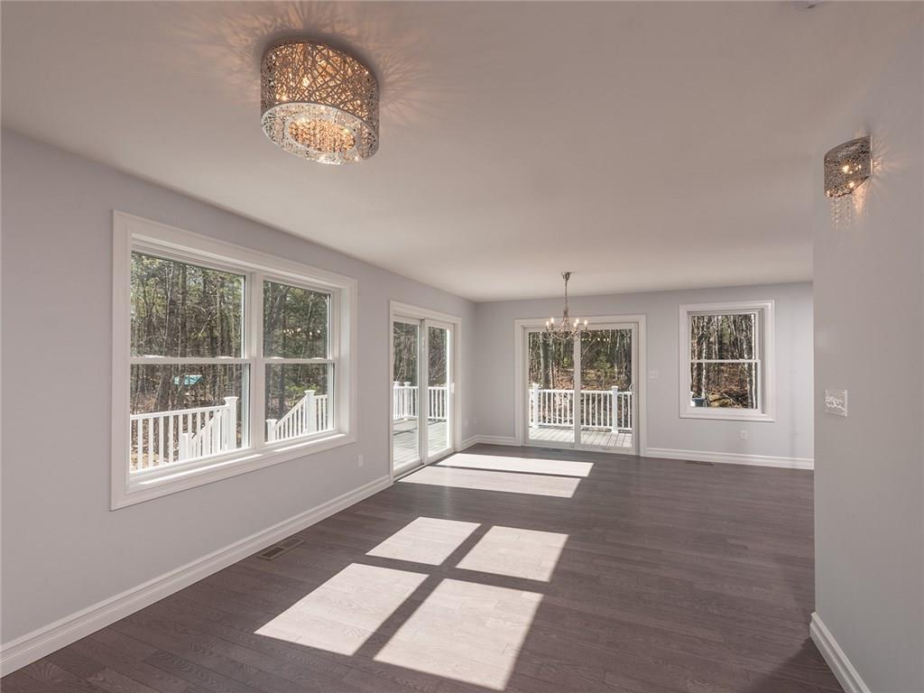 180 Mountain Road York, ME 03902 - Photo 10 of 23 Sitting room with double sliders to...