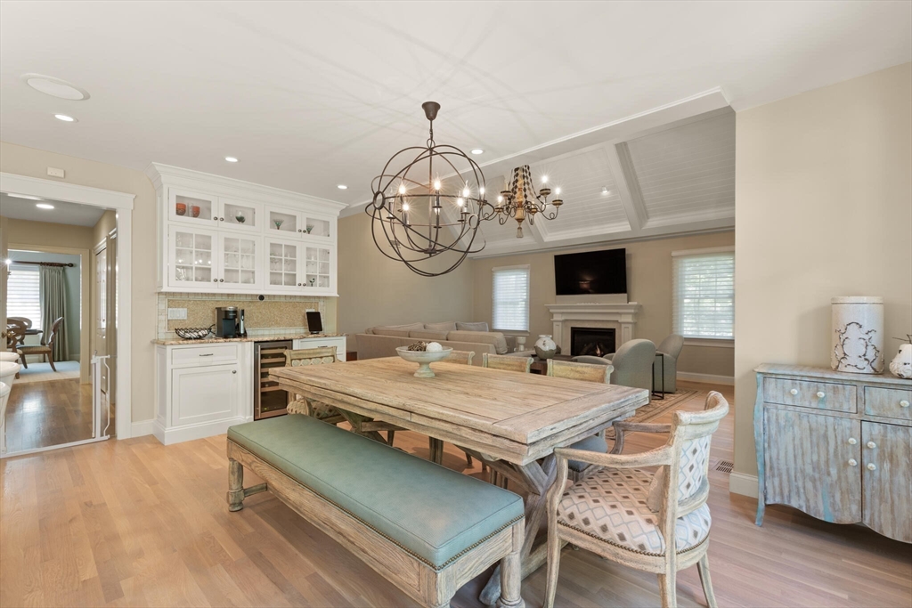 54 Greensward Circle Mashpee, MA 02649 - Photo 14 of 42 a view of a dining room with furniture window and wooden floor