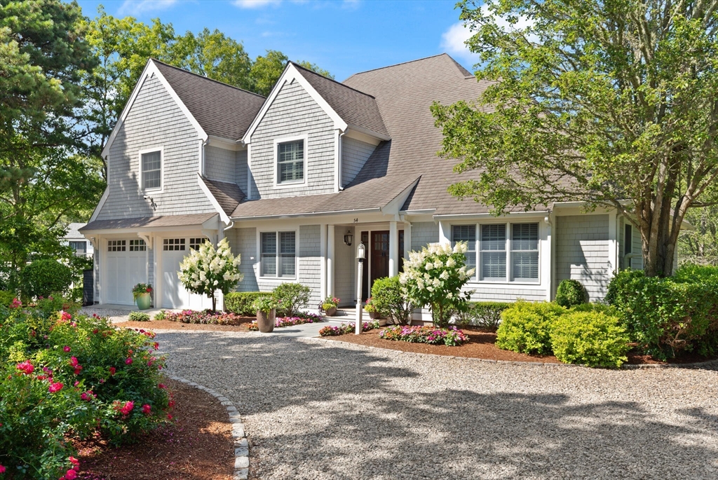 54 Greensward Circle Mashpee, MA 02649 - Photo 2 of 42 front view of a house with a yard