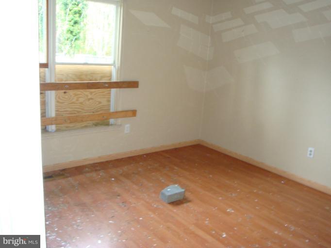 954 Crystal Rock Road Lusby, MD 20657 - Photo 9 of 11 a view of empty room with window