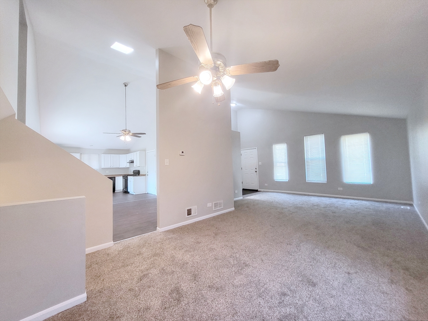 14326 Irving Avenue Dolton, IL 60419 - Photo 16 of 31 a view of an empty room with a ceiling fan and window
