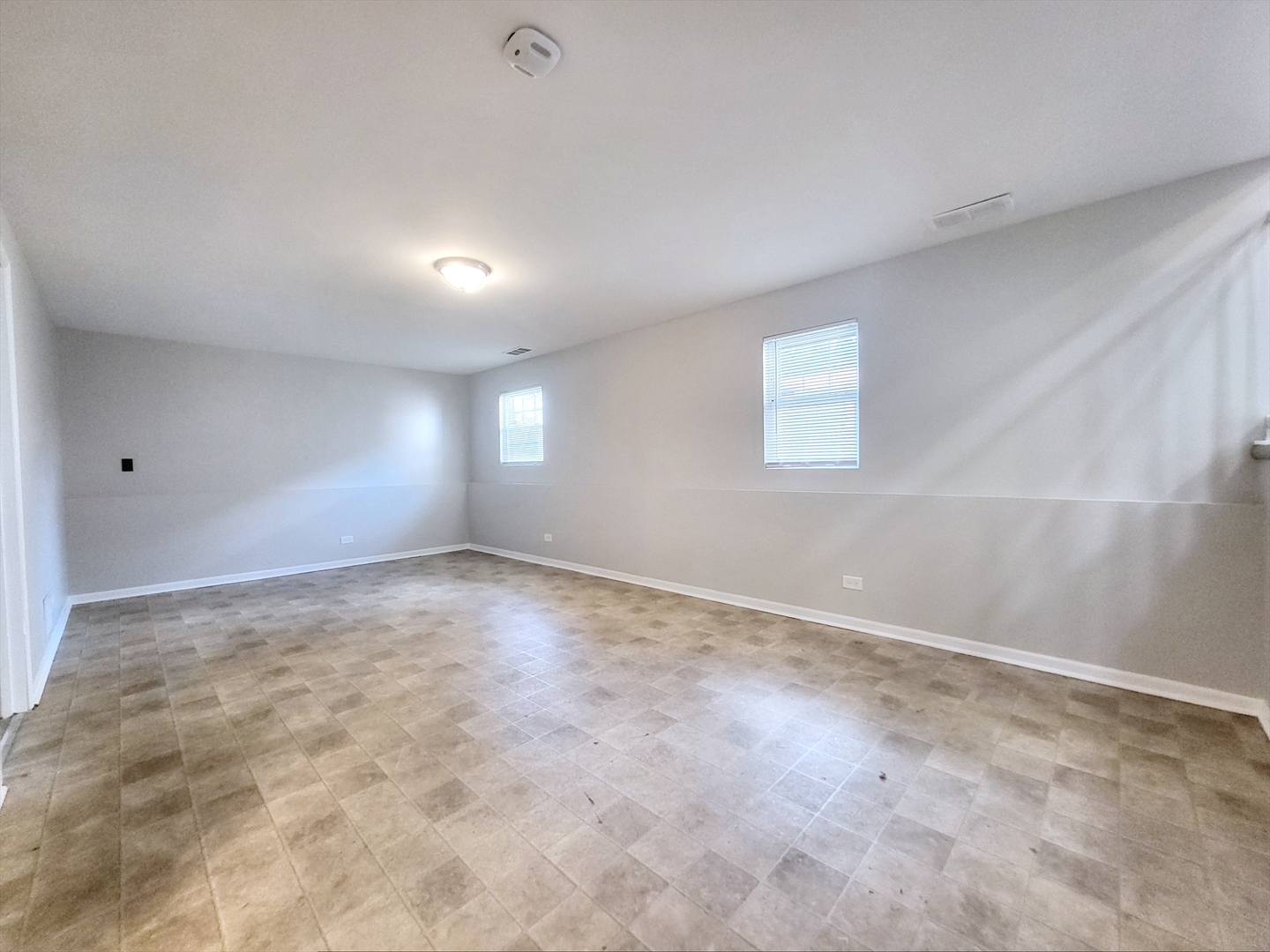 14326 Irving Avenue Dolton, IL 60419 - Photo 21 of 31 an empty room with a empty space and windows