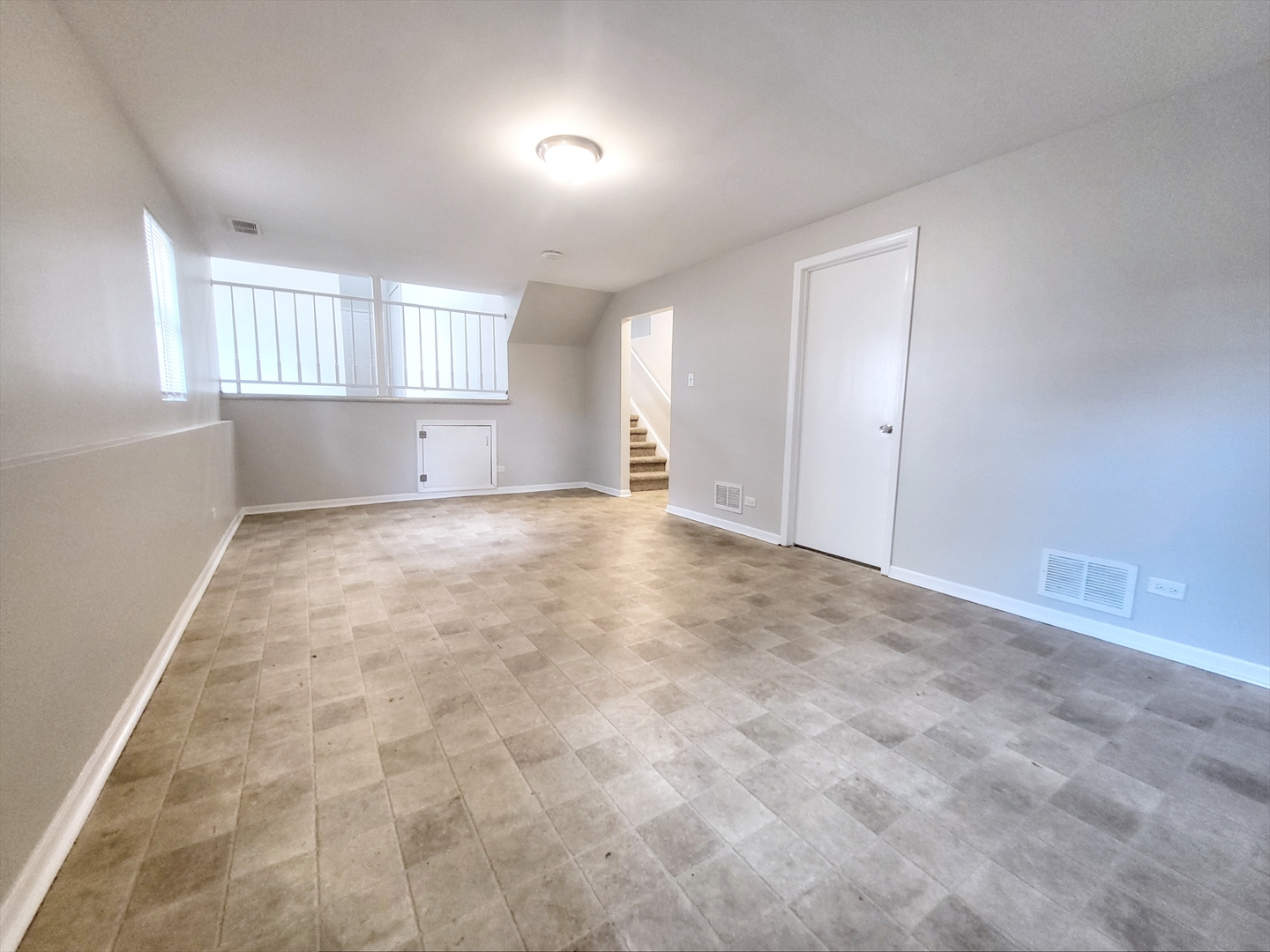 14326 Irving Avenue Dolton, IL 60419 - Photo 5 of 31 a view of an empty room with a window
