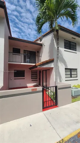 a view of a house with a garage