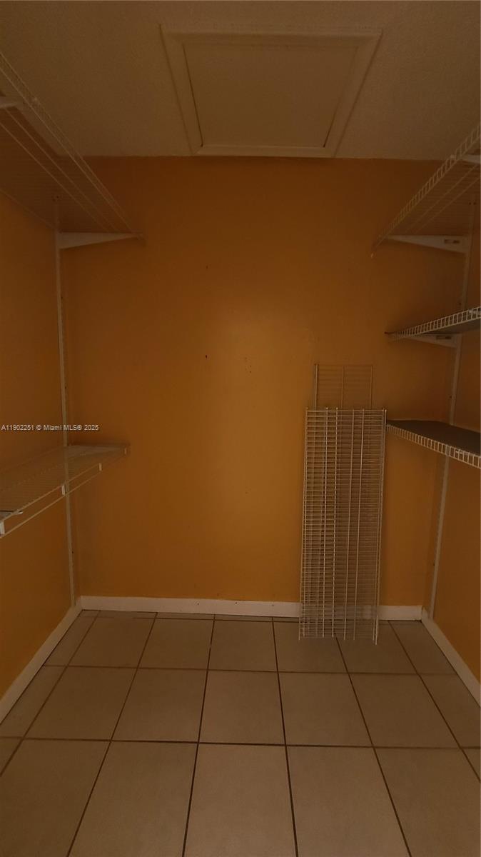13458 Southwest 62nd Street, Unit Q105 Miami, FL 33183 - Photo 15 of 16 a view of a room
