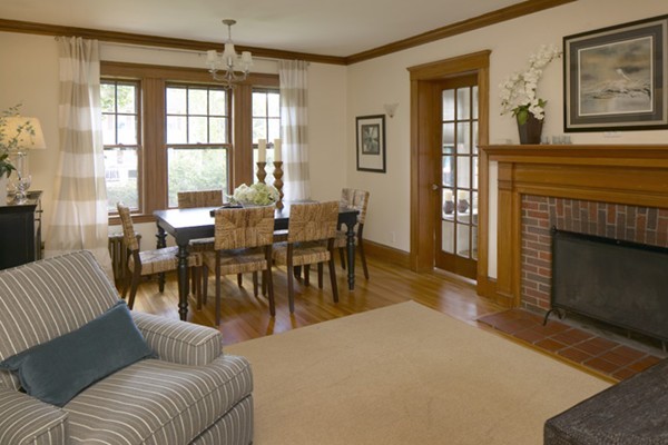 67 Ravine Road Medford, MA 02155 - Photo 3 of 9 a living room with furniture a large window and a fireplace