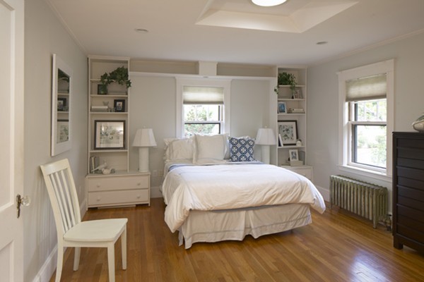67 Ravine Road Medford, MA 02155 - Photo 8 of 9 a bedroom with a bed wooden floor and window