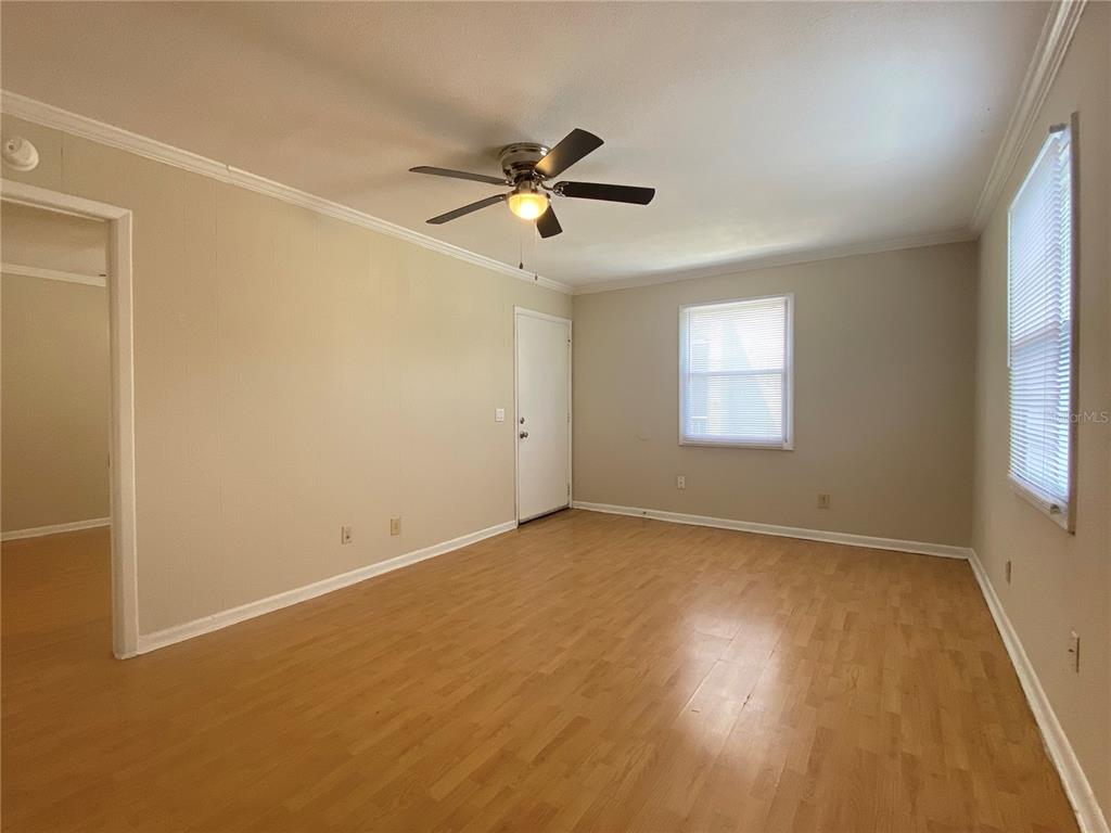 5115 Curry Ford Road, Unit 3 Orlando, FL 32812 - Photo 6 of 12 a view of an empty room with a window