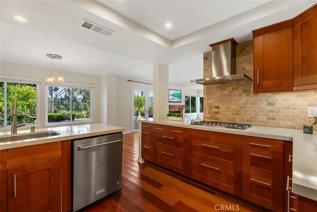 a kitchen with sink cabinets and window