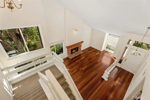 a living room with chairs and a stove