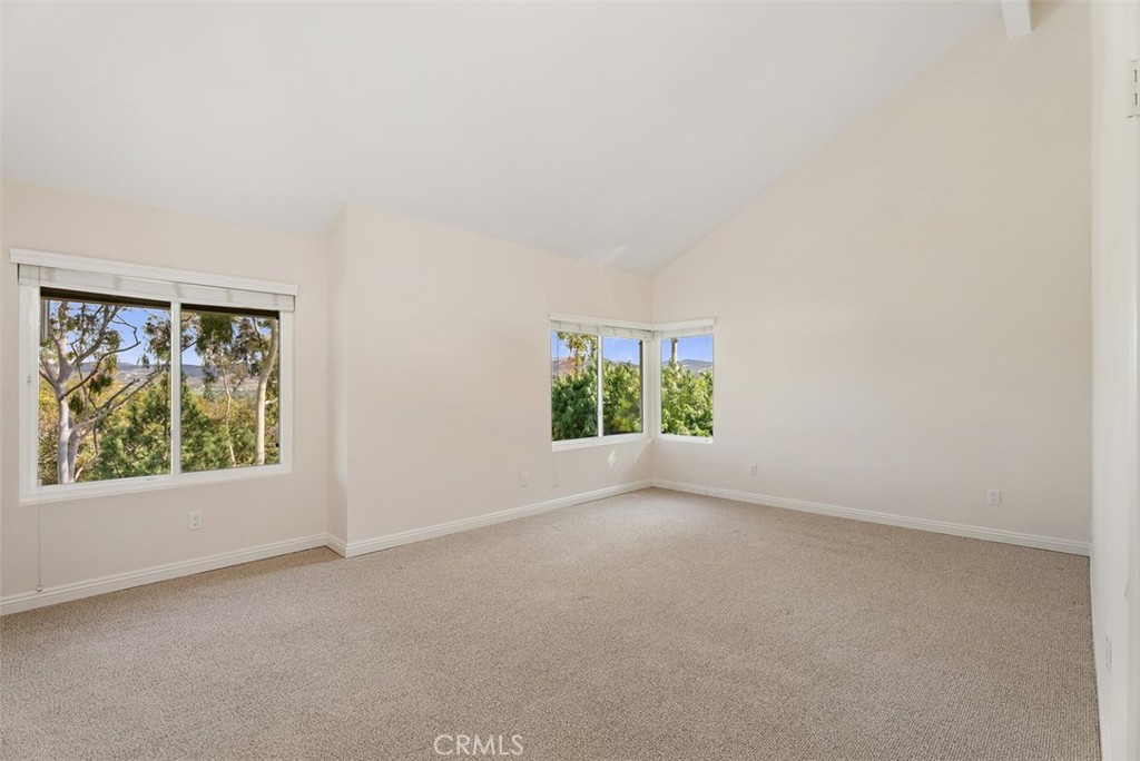 26 Southern Wood Irvine, CA 92603 - Photo 21 of 31 an empty room with windows