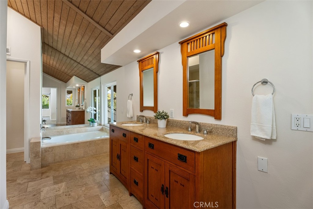 26 Southern Wood Irvine, CA 92603 - Photo 25 of 31 a bathroom with a granite countertop sink mirror and double