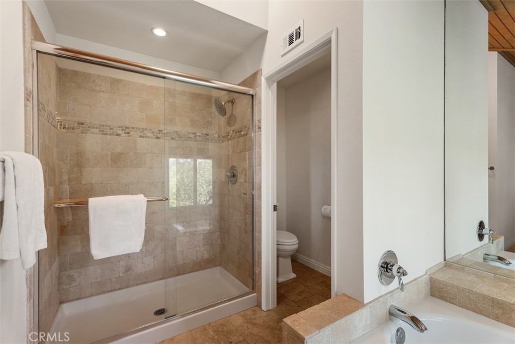 26 Southern Wood Irvine, CA 92603 - Photo 26 of 31 a bathroom with a shower and a sink