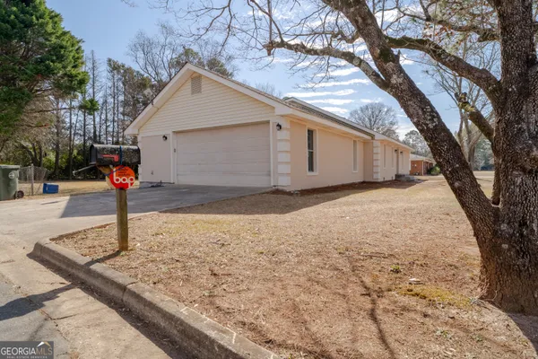 a front view of a house with street