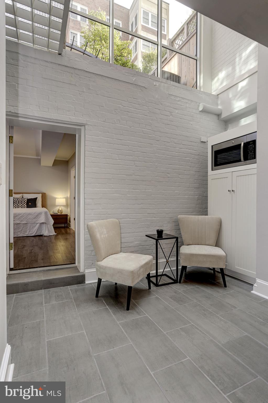 2543 Waterside Drive Northwest Washington, DC 20008 - Photo 12 of 41 Light Filled from Open Conservatory