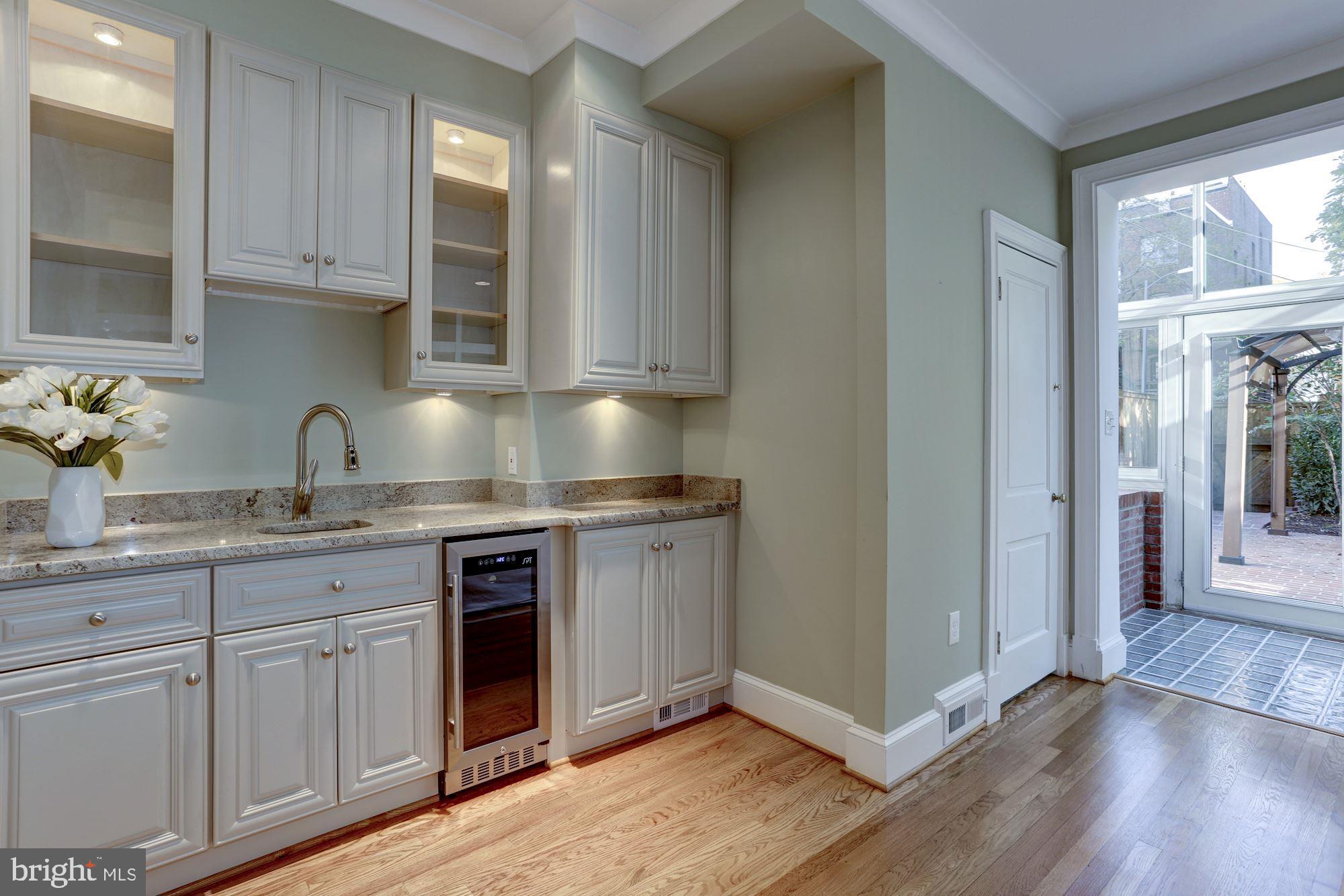 2543 Waterside Drive Northwest Washington, DC 20008 - Photo 21 of 41 Custom Cabinets w Wine Cooler and Wet Bar