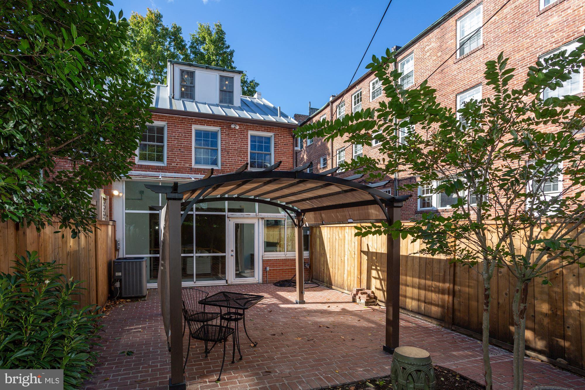 2543 Waterside Drive Northwest Washington, DC 20008 - Photo 38 of 41 Bricked Patio with Pergola