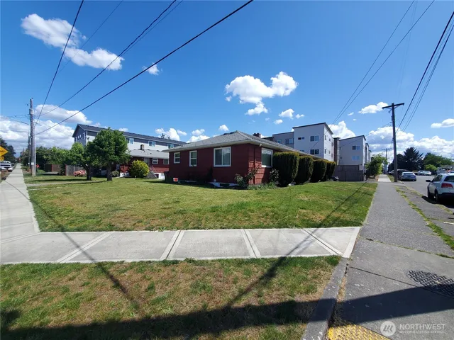 a view of a big yard with potted plants