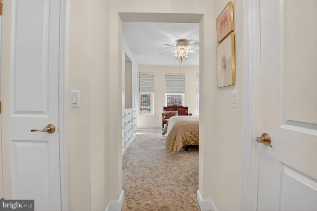 a bed room with a bed and a mirror