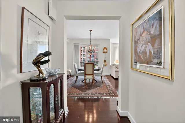 a view of a livingroom with furniture and wooden floor