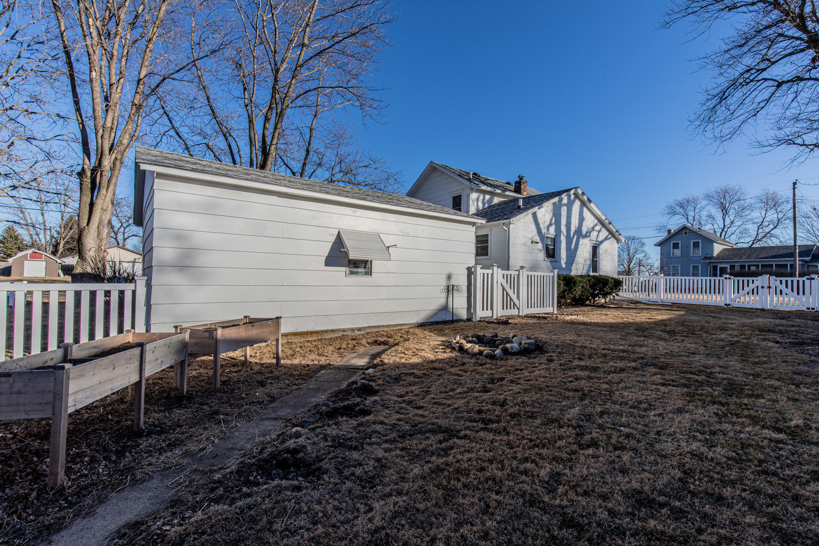 220 2nd Street Wyanet, IL 61379 - Photo 25 of 27 a view of a house with a yard