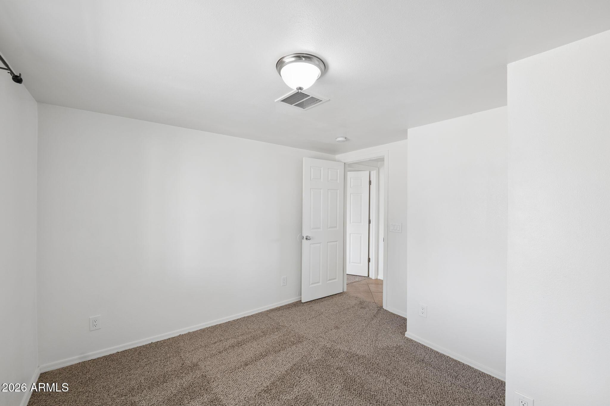 7 South Catalina Street Gilbert, AZ 85233 - Photo 26 of 34 a view of a livingroom with an empty space