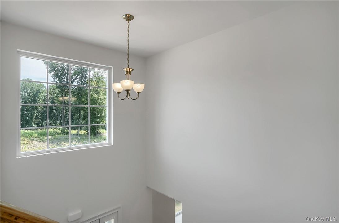 Lot 14-31 Sawyer Way Wallkill, NY 12589 - Photo 19 of 31 a room with a window and ceiling fan