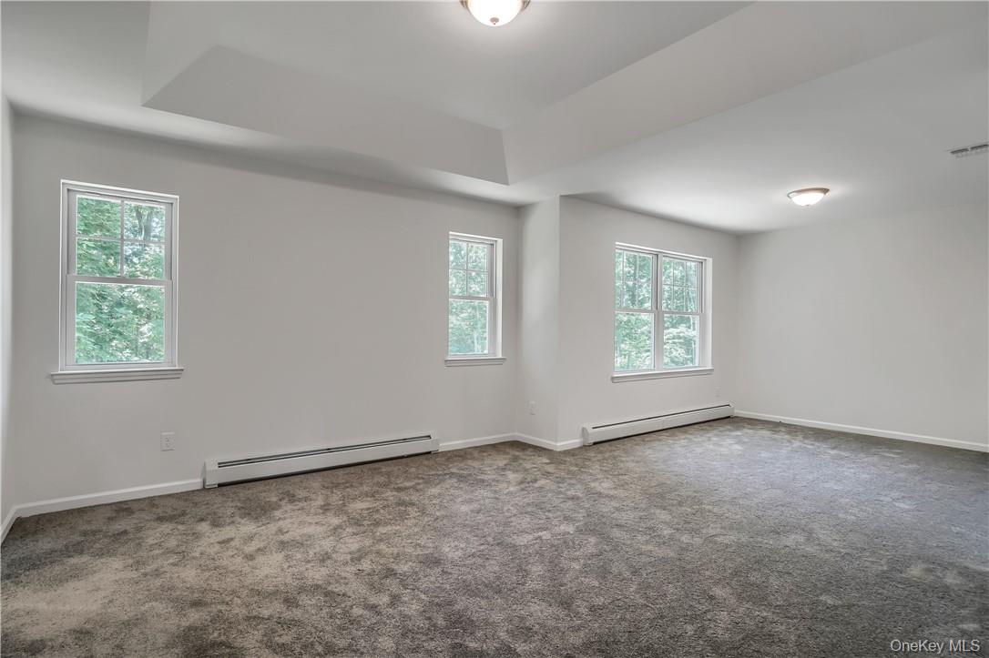 Lot 14-31 Sawyer Way Wallkill, NY 12589 - Photo 25 of 31 an empty room with windows