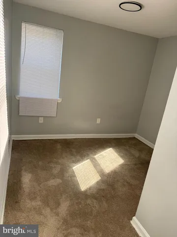 an empty room with a door