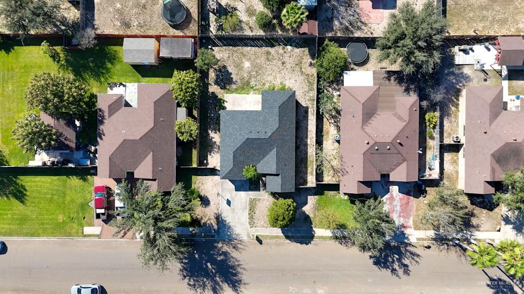 1602 East Rabbit Run Avenue Alton, TX 78573 - Photo 15 of 18 an aerial view of a house with a yard and garden