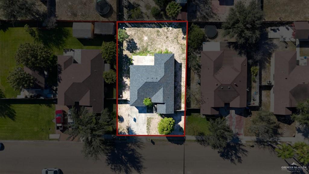 1602 East Rabbit Run Avenue Alton, TX 78573 - Photo 16 of 18 an aerial view of a house with a yard
