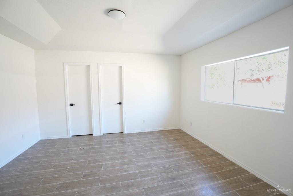 1602 East Rabbit Run Avenue Alton, TX 78573 - Photo 9 of 18 a view of an empty room