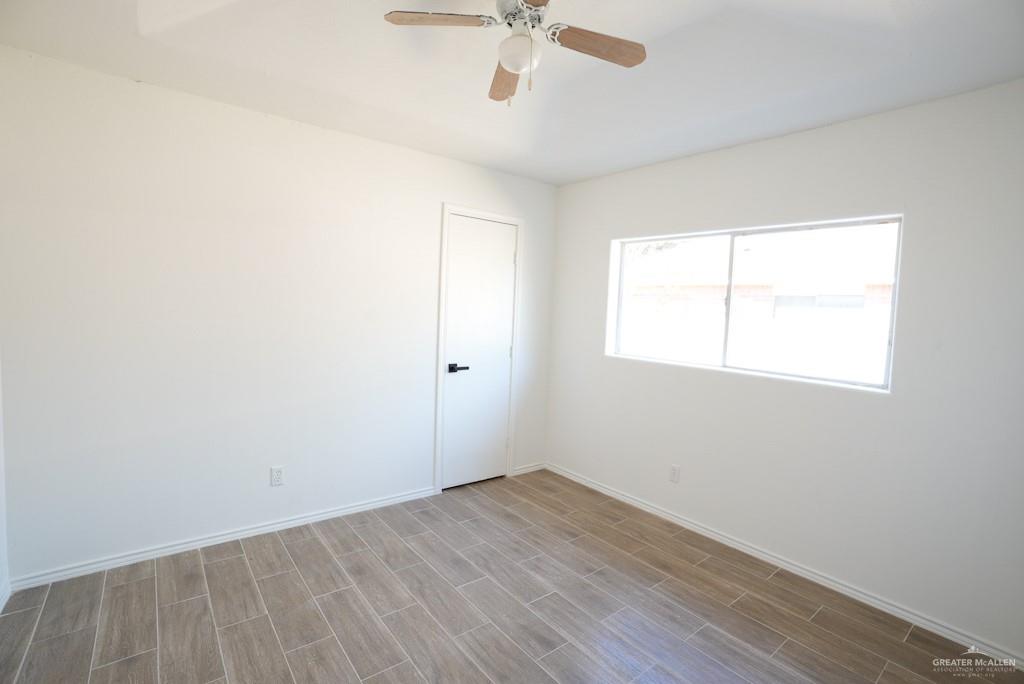 1602 East Rabbit Run Avenue Alton, TX 78573 - Photo 10 of 18 an empty room with a window