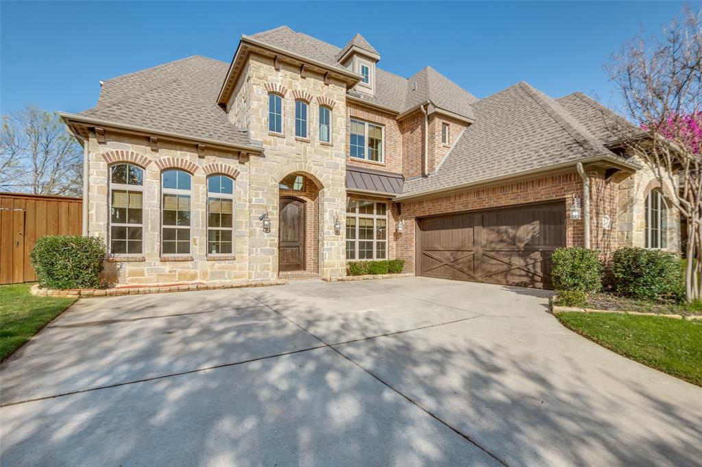 3407 Gentry Road Irving, TX 75062 - Photo 1 of 1 a front view of a house with a garden