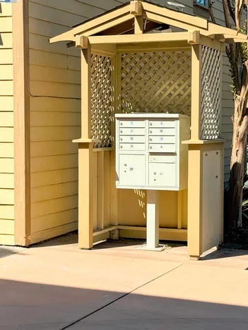 a view of a street with an outdoor seating