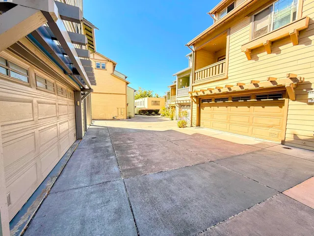 a view of a house with outdoor space and sitting area