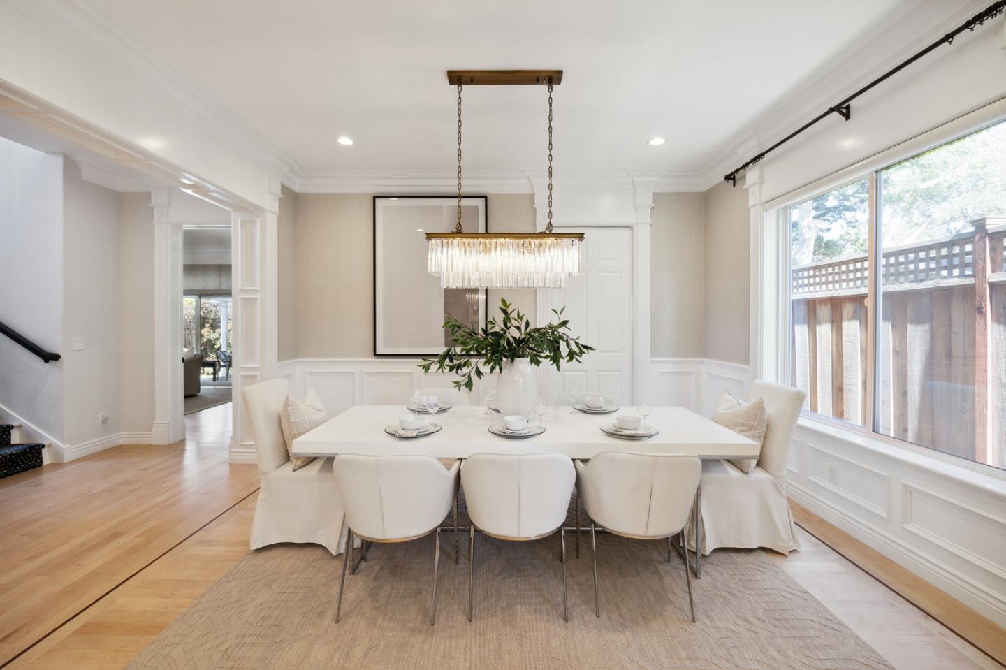 1330 Benito Avenue Burlingame, CA 94010 - Photo 18 of 60 a view of a dining room with furniture large windows and wooden floor