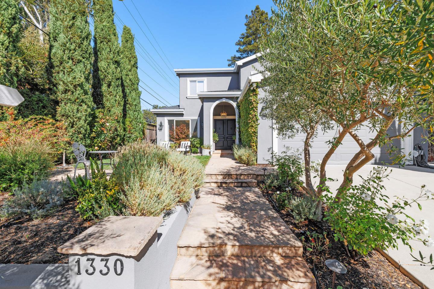 1330 Benito Avenue Burlingame, CA 94010 - Photo 2 of 60 a front view of a house with garden