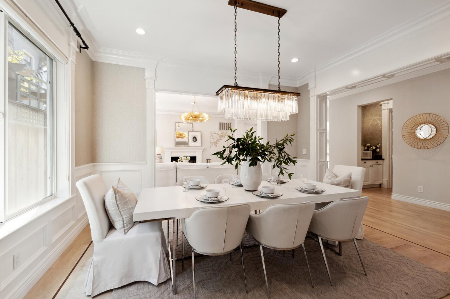 1330 Benito Avenue Burlingame, CA 94010 - Photo 21 of 60 a dining room with furniture potted plants and wooden floor