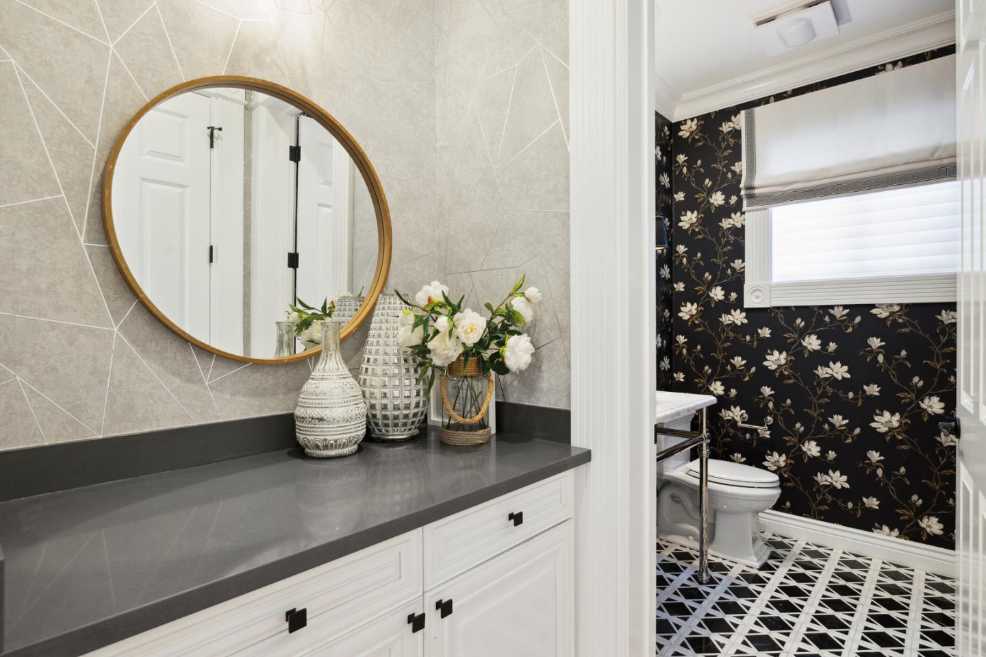 1330 Benito Avenue Burlingame, CA 94010 - Photo 23 of 60 a bathroom with a granite countertop sink a toilet and a mirror
