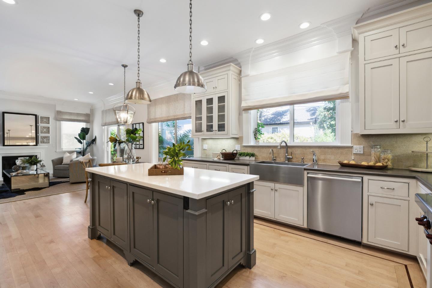 1330 Benito Avenue Burlingame, CA 94010 - Photo 32 of 60 a kitchen with kitchen island granite countertop a sink a stove and a wooden floors