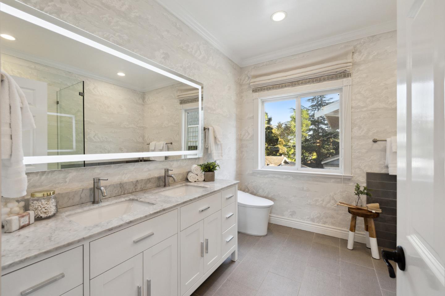 1330 Benito Avenue Burlingame, CA 94010 - Photo 39 of 60 a bathroom with a granite countertop sink mirror and a bathtub