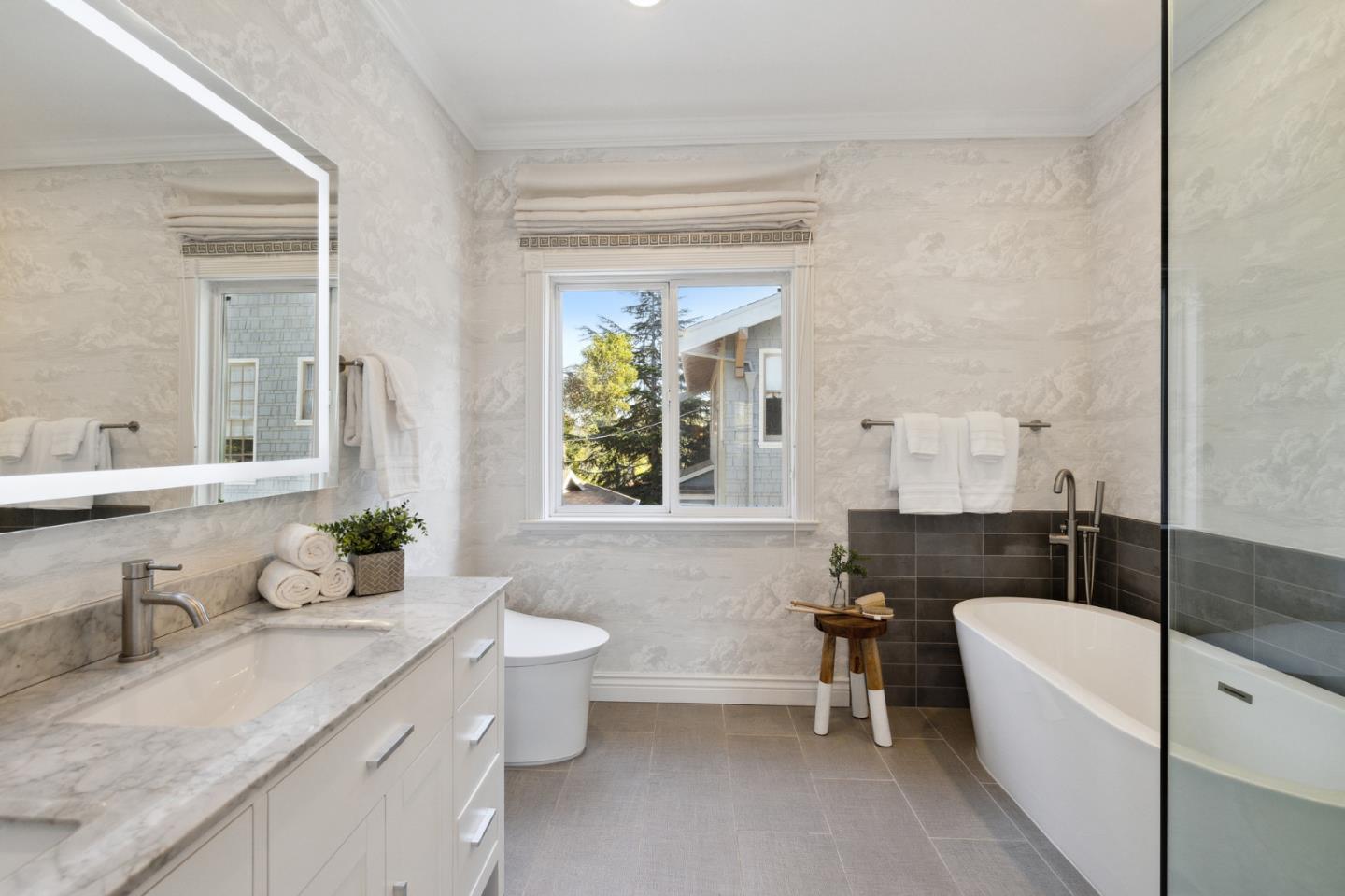 1330 Benito Avenue Burlingame, CA 94010 - Photo 40 of 60 a bathroom with a granite countertop sink mirror bathtub and toilet