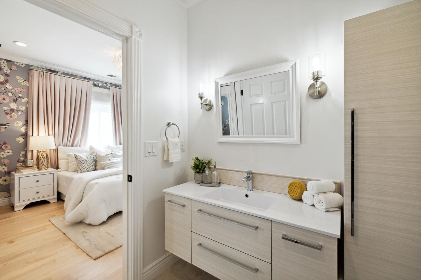 1330 Benito Avenue Burlingame, CA 94010 - Photo 45 of 60 a bathroom with a double vanity sink a mirror and a bathtub