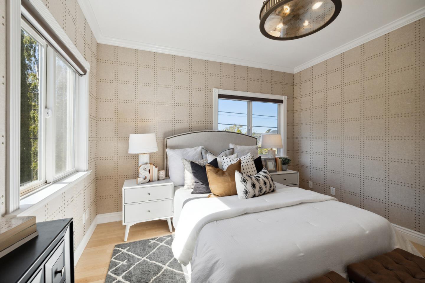 1330 Benito Avenue Burlingame, CA 94010 - Photo 48 of 60 a bedroom with a bed and a chair