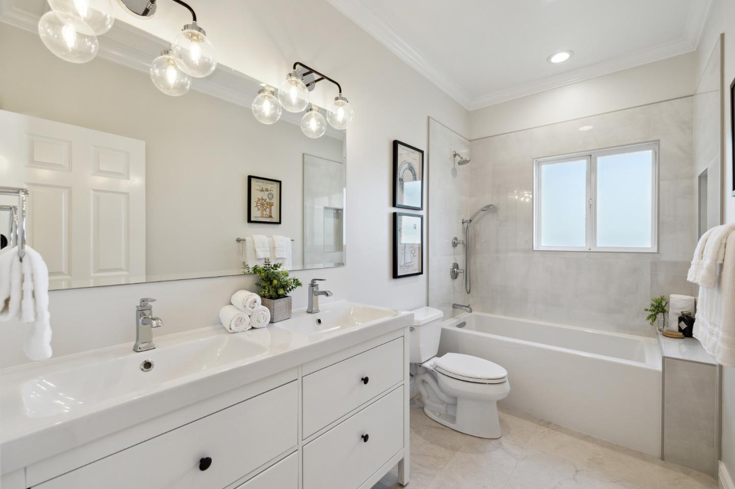 1330 Benito Avenue Burlingame, CA 94010 - Photo 49 of 60 a bathroom with a toilet a sink a large mirror and shower